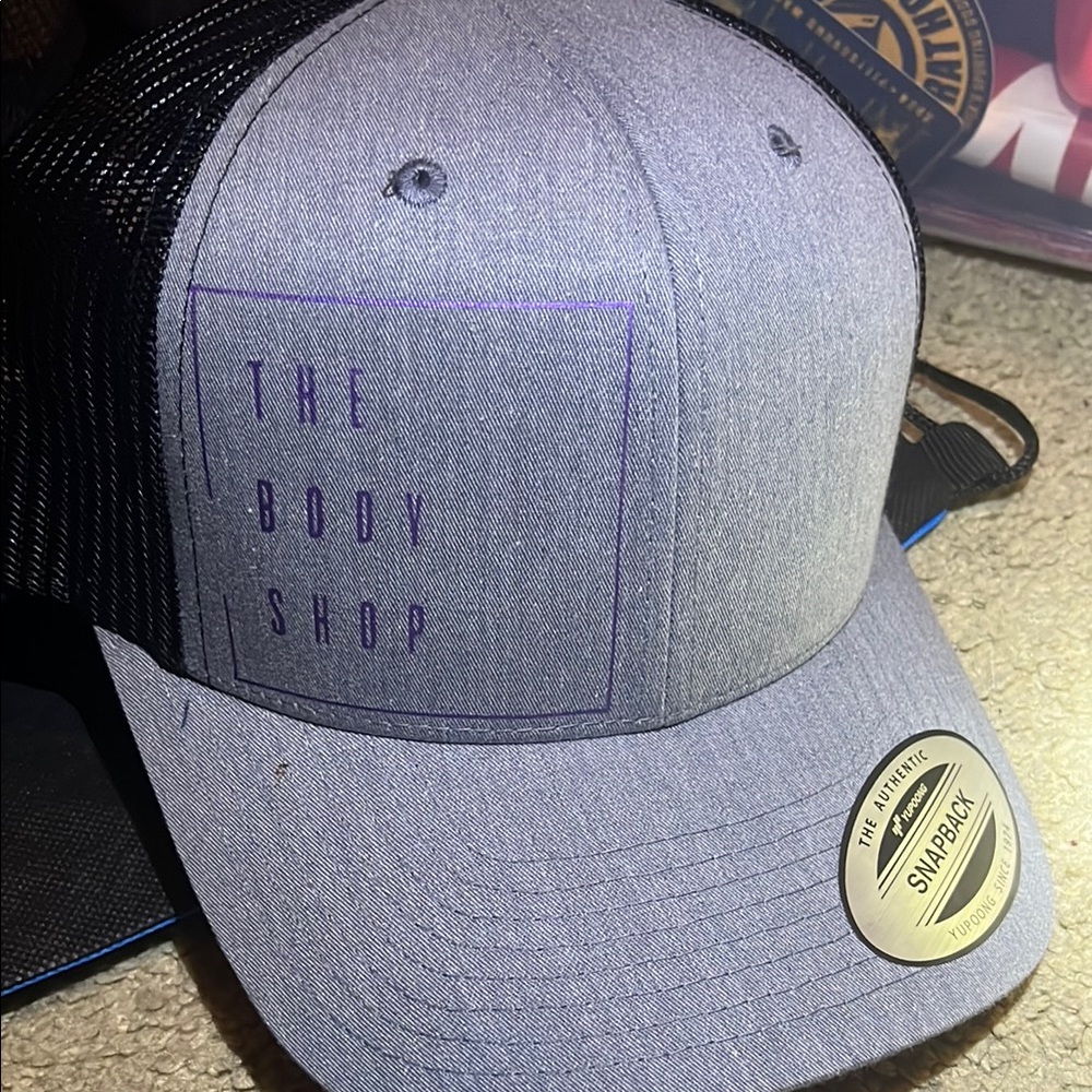 The Body Shop Blue and Black Snapback Hat